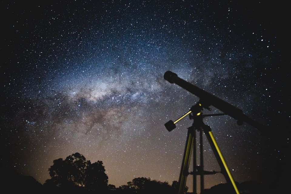 best telescope pointed up at a brilliant star filled sky