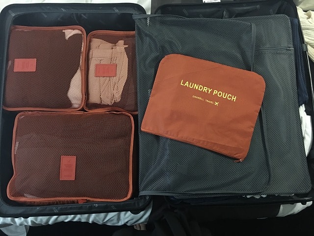 packing cubes inside a travel suitcase