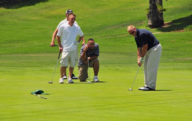 men playing golf