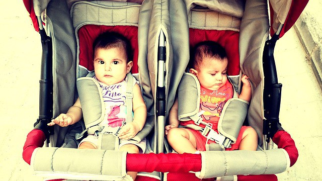 twins in double stroller